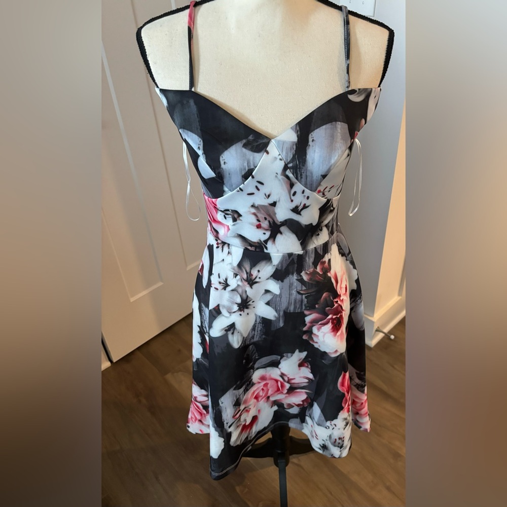 Venus spaghetti strap, hi-low dress.  Has arm strap in addition to strap. XS
